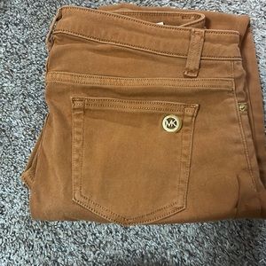 Michael kors jeans, size 8 worn only like 2 times. Color:Burnt orange.